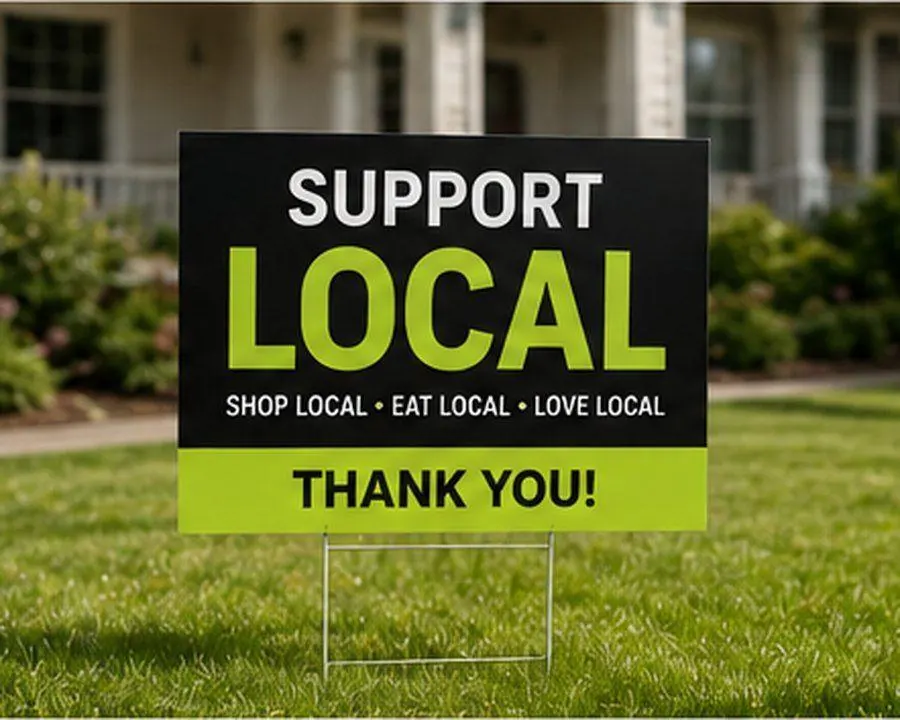 Custom 18 by 24 yard sign staked in a lawn